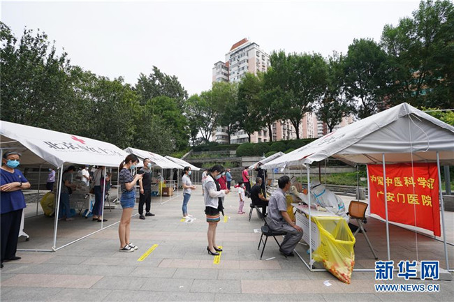 （新華全媒頭條·圖文互動(dòng)）（5）首都再戰(zhàn)“疫”，難忘40天——寫在北京應(yīng)急響應(yīng)級(jí)別降級(jí)之際 